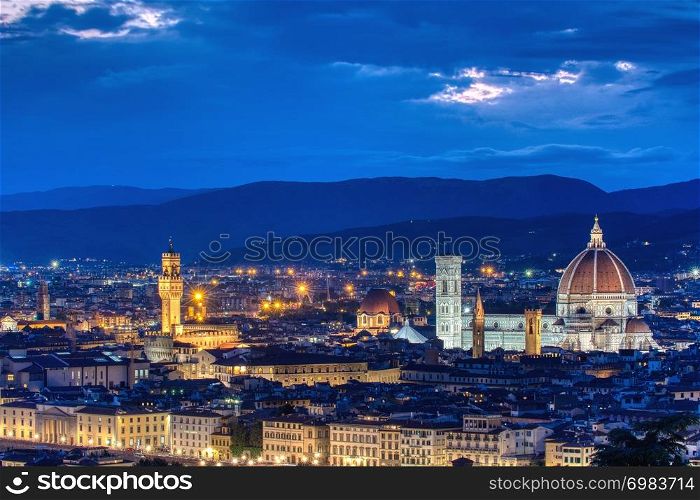 Duomo Santa Maria Del Fiore and tower of Palazzo Vecchio at sunset in Florence, Tuscany, Italy