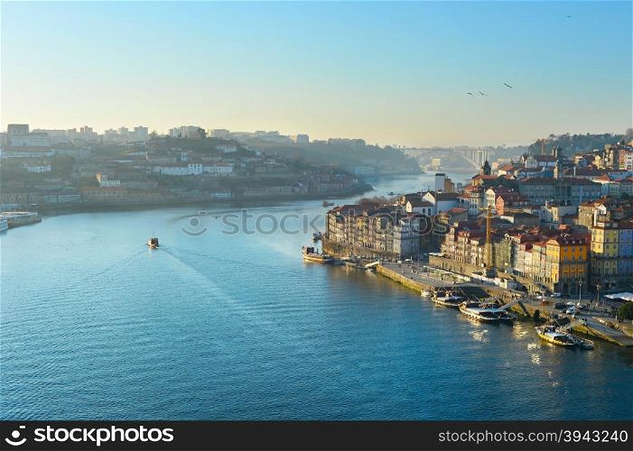 Duoro river and famous Porto architecture in beautiful sunset light. Portugal