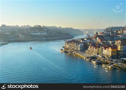 Duoro river and famous Porto architecture in beautiful sunset light. Portugal