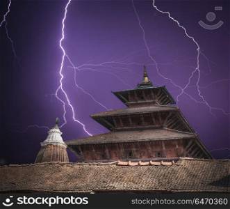 Durbar Square in the center of Kathmandu, Nepal. Bright flashes of lightning during a thunderstorm.. Durbar Square in the center of Kathmandu