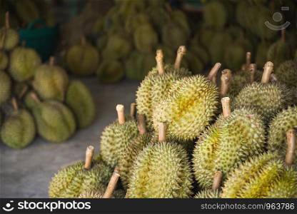 Durian tropical fruit on texture background for sale in the fruit market on summer