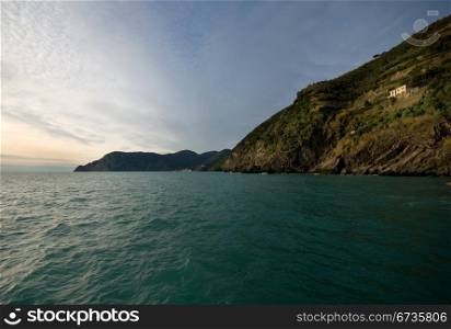 Dusk on the Mediterranean coastline, captured from Vernazza, Cinque Terre, Italy