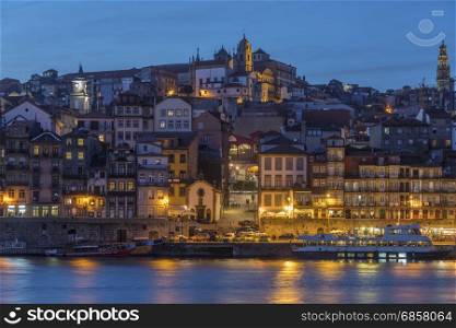 Dusk over the Ribeira waterfront in the city of Porto (Oporto) in Portugal.