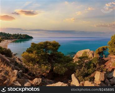 Dusk sandy Kaviou beach. Summer top view  Nikiti, Sithonia, Halkidiki, Greece .