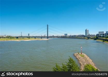 Dusseldorf city cityscape with bridge Rhine with river. Dusseldorf city cityscape with bridge Rhine with river in front