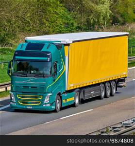 DUSSELDORF ,GERMANY - APRIL 20, 2017: Truck transportation,import,export logistic industrial running on highway