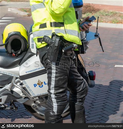 Dutch motor police officer with protective equipment