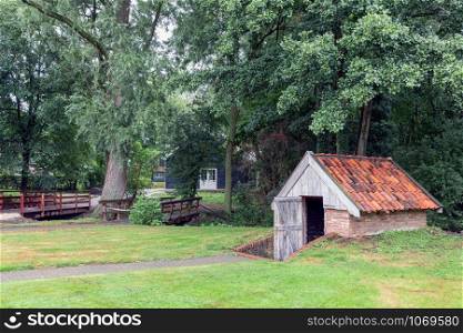 Dutch rural open-air museum with small shed for winter storage of potoatoes. Dutch open-air museum with small shed for winter storage potoatoes