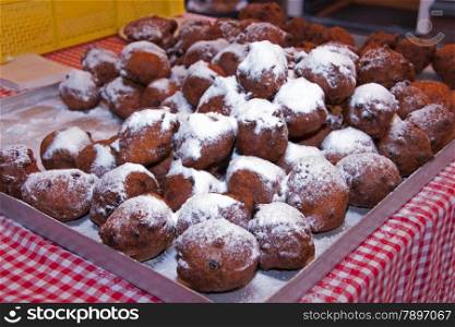 dutch traditional food with sugar for new year called oliebollen