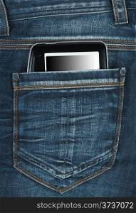 e-book in the back pocket of blue jeans