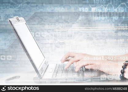 E-business concept. Hands of businessman running with fingers on laptop keyboard