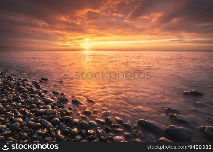 Eπc sunset on the sea. Beautiful nature background composition.