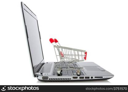 E-commerce. Shopping cart on laptop over a white background