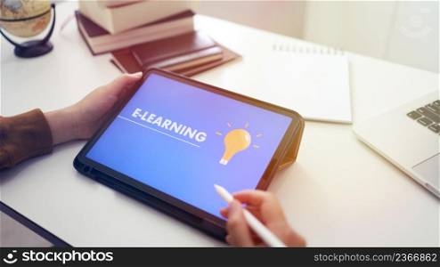 E-Learning concept with website on tablet. Education Internet Technology Web Online
