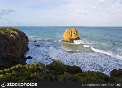 Eagle Rock is a tall volcanic stack capped by limestone located near the Split Point Lighthouse in Victoria, Australia