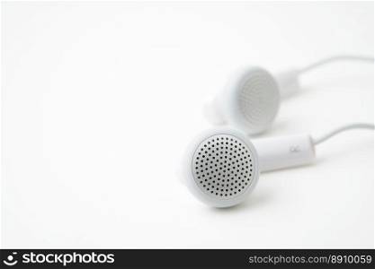 earbuds on white background