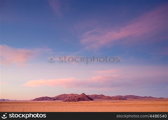 Early morning sunrise in the Namib desert near Aus.