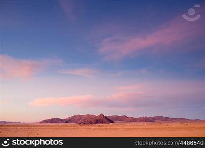 Early morning sunrise in the Namib desert near Aus.