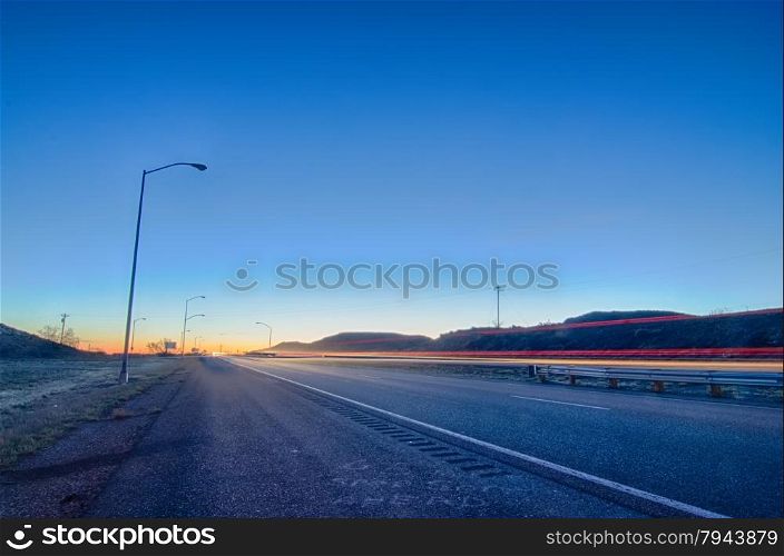 early orning travel on highway before sunrise