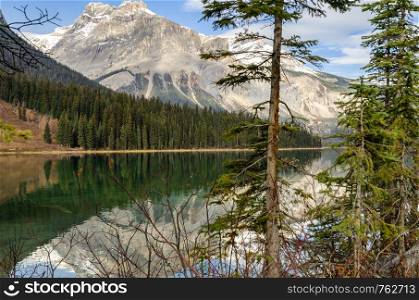 Early winter view of Emerald Lake with Rocky mountain reflection in Yoho National Park, British Columbia, Canada