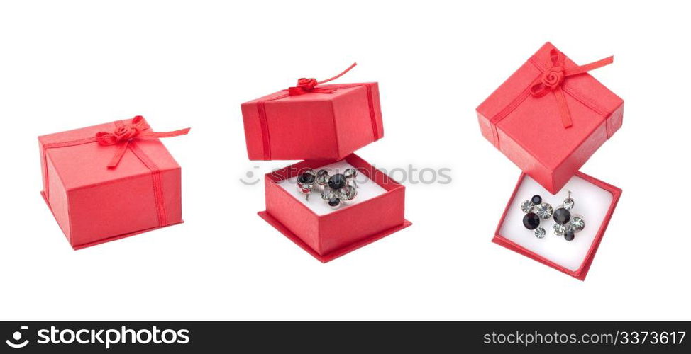 Earring in red present box isolated on white