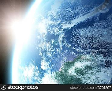 Earth and sun. Space sunrise