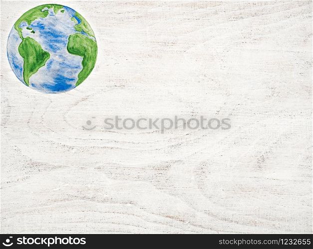 Earth Day. Beautiful greeting card. Isolated background, close-up, view from above, wooden surface. Congratulations for relatives, friends and colleagues. Earth Day. Beautiful greeting card. Top view
