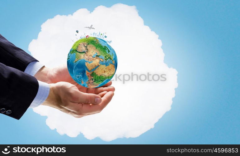 Earth day. Close up of male hand holding our Earth planet. Elements of this image are furnished by NASA