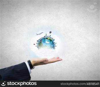 Earth day. Close up of male hand holding our Earth planet. Elements of this image are furnished by NASA