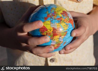 Earth globe in hands as Environment and save planet concept