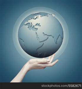 Earth globe into female hand, abstract eco backgrounds