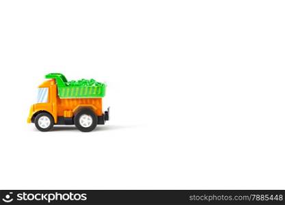 Earth moving toy. Orange and Green truck.