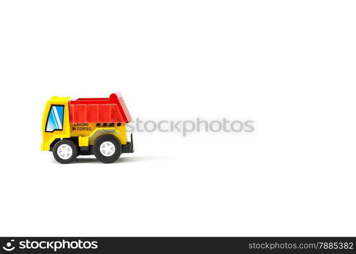 Earth moving toy. Yellow and red truck.