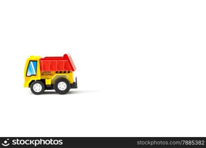 Earth moving toy. Yellow and red truck.