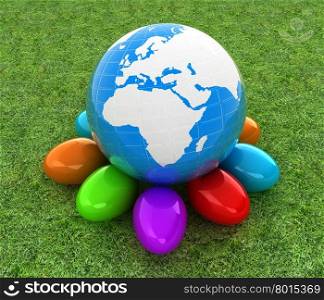 Earth on Colored Easter eggs on a green grass
