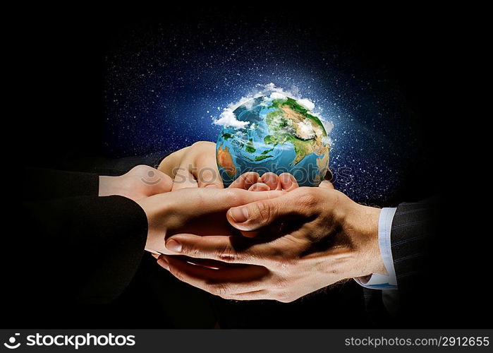 Earth planet in hands