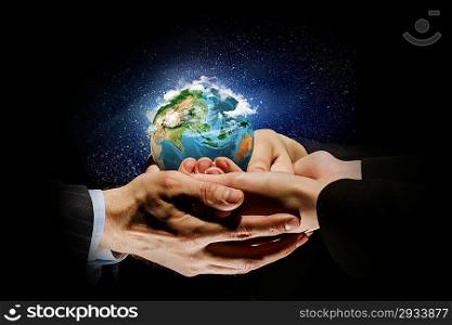 Earth planet in hands
