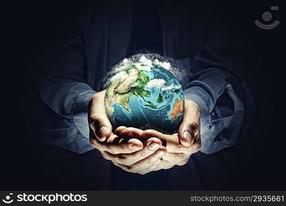 Earth planet in hands