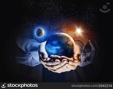 Earth planet in hands