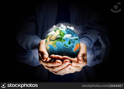 Earth planet in hands