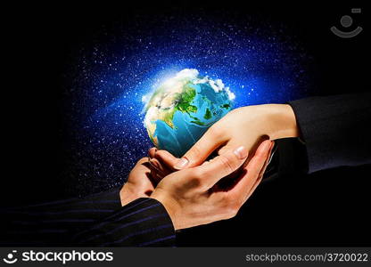 Earth planet in hands