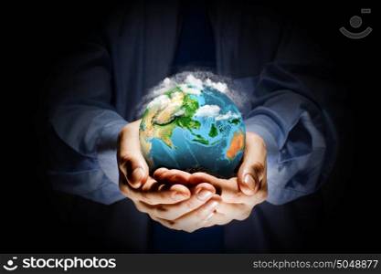 Earth planet in hands. Let&rsquo;s save our planet earth. Ecology concept. Elements of this image are furnished by NASA