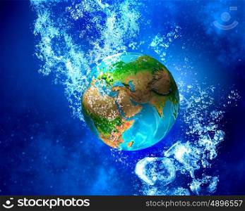 Earth planet under water. Earth planet sinking in clear blue water. Elements of this image are furnished by NASA