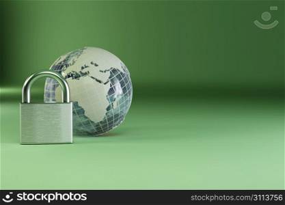 Earth with padlock on green background. 3d