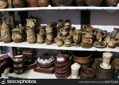 earthenware on sale. ceramic handmade brown earthenware like pots and carafe on sale