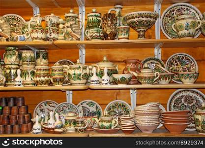 earthenware on the shelves of pottery shop. earthenware on the shelves of pottery shop. Art of pottery