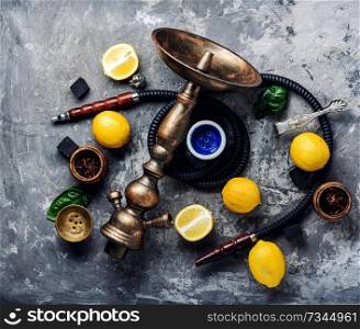 East hookah with fruit aroma for relax.Shisha hookah.Hookah with lemon. Hookah with lemon