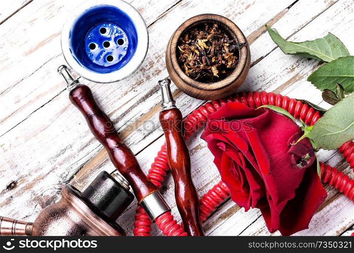 East hookah with rose aroma for relax.Shisha hookah.Hookah with flower.. Flower with hookah