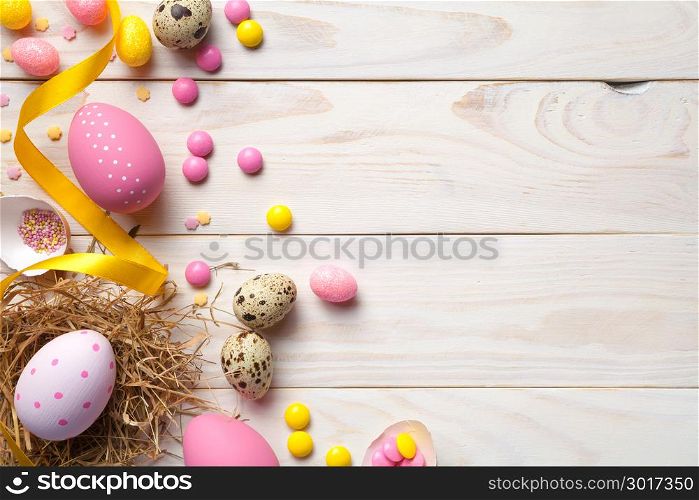 Easter background with easter eggs. Copy space. Top view