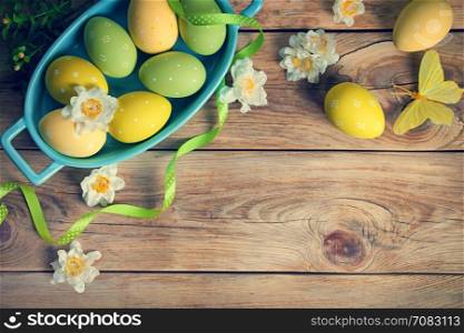 Easter background with Easter eggs. Top view. Copy space